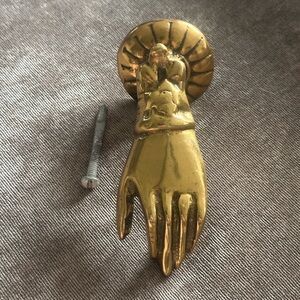 Vintage brass hand knocker